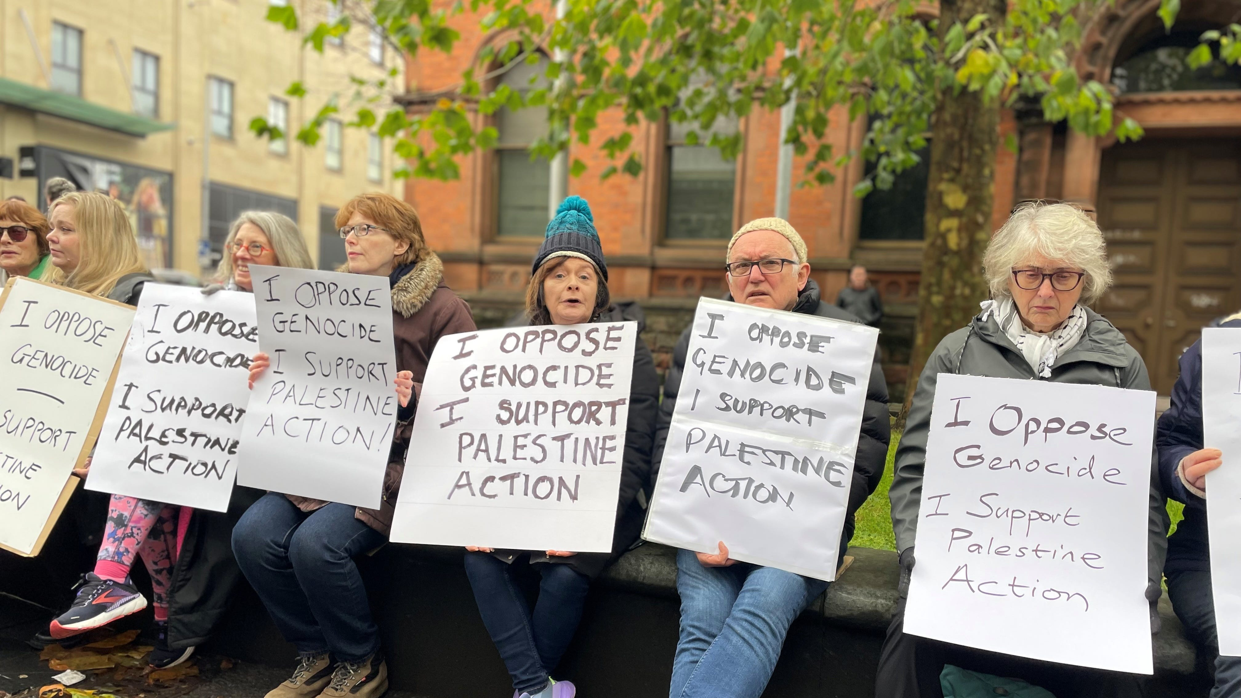 Same placards, different fates: 90 arrested in London, zero in Belfast