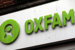 A sign is seen above a branch of Oxfam, in central London