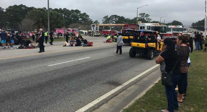 Emergency crews respond to the scene of the parade, which was canceled