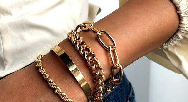 Chunky bracelets add a hint of edginess to your style [Click my Hand]