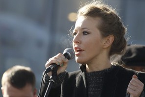 Television host and opposition activist Sobchak delivers a speech during a demonstration for fair el