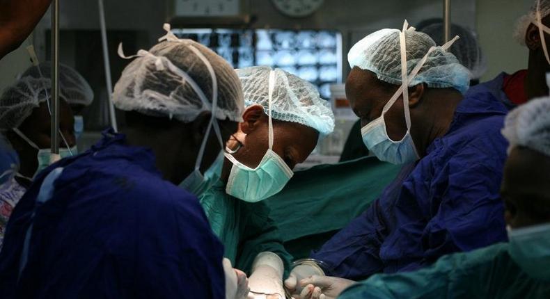 Kenyan surgeons performing a procedure