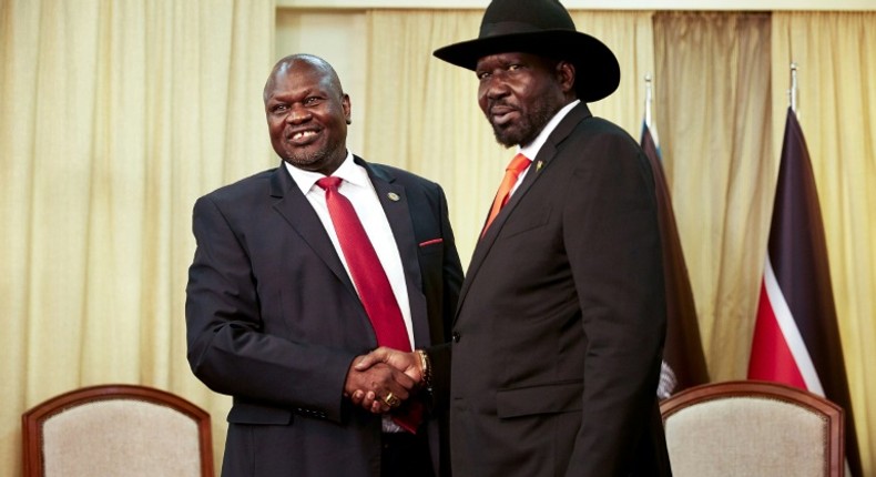 South Sudan's former rebel leader Riek Machar (left) meets with South Sudan's President Salva Kiir in October 2019