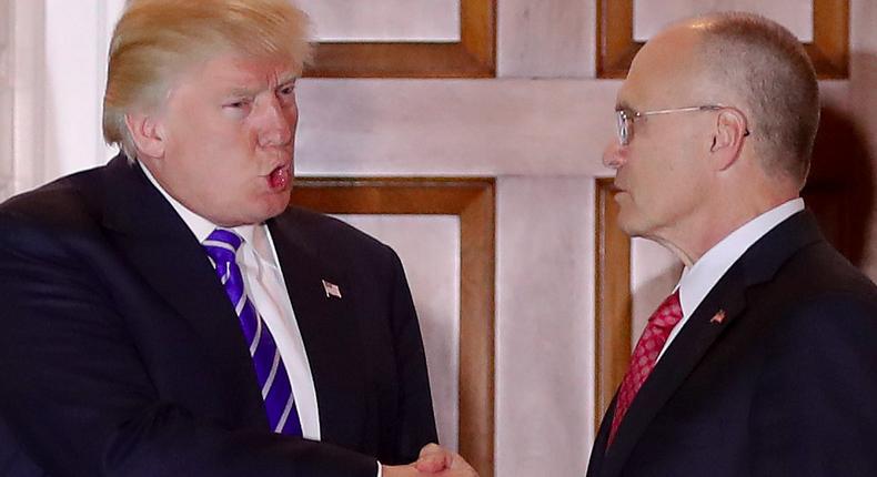 Donald Trump meets with Andy Puzder, chief executive of CKE Restaurants, in November.