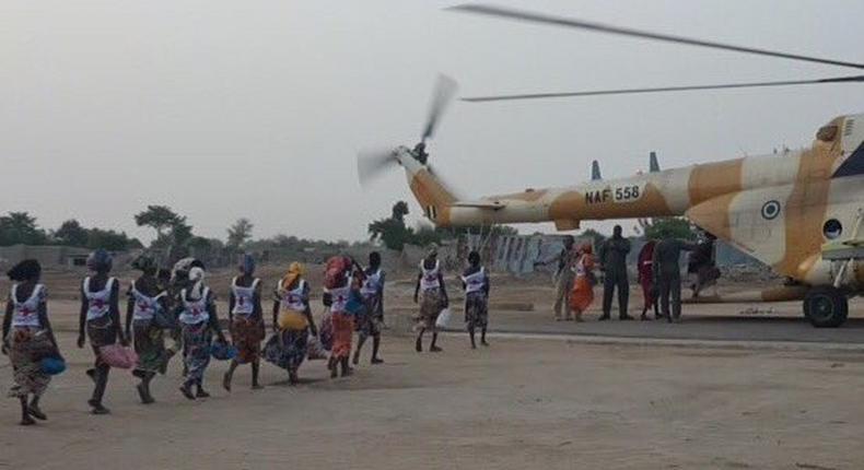 Some of the rescued Chibok Girls board a military helicopter