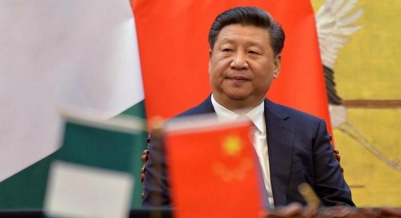 Chinese President, Xi Jinping attends a signing ceremony with President of the Federal Republic of Nigeria, Muhammadu Buhari (not pictured) at the Great Hall of the People in Beijing, April 12, 2016. REUTERS/Kenzaburo Fukuhara/Pool