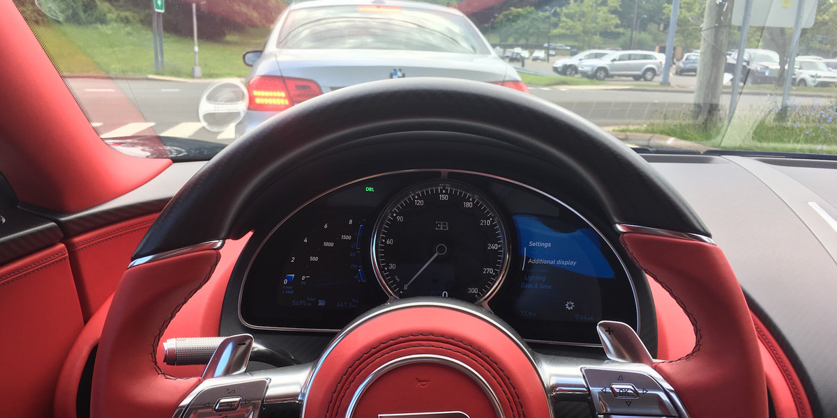Inside a Bugatti Chiron, whose speedometer tops out at 300 mph.