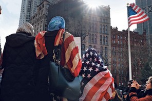 A muslim perspective Women wear an American flag head scarf for World Hijab Day at an event at City Hall in Manhattan in 2017. The day was started in 2012 when a Muslim woman in New York City invited other women to experience what it is like to wear a hijab every day in America.