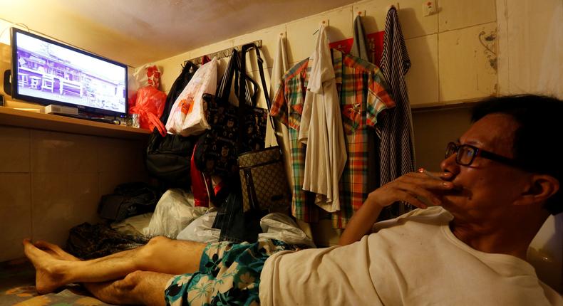 Simon Wong, 61, is one of thousands living in so-called coffin homes in Hong Kong.