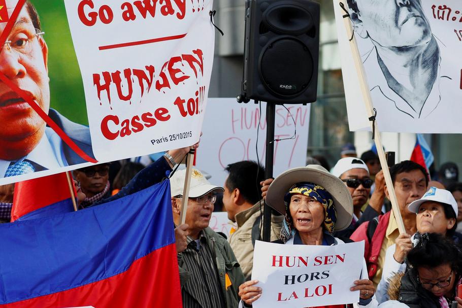 Protesters attend a protest against Cambodia's Prime Minister Hun Sen during the EU-Asia leaders sum