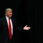 U.S. Republican presidential candidate Trump reacts as he is introduced during a campaign event in C