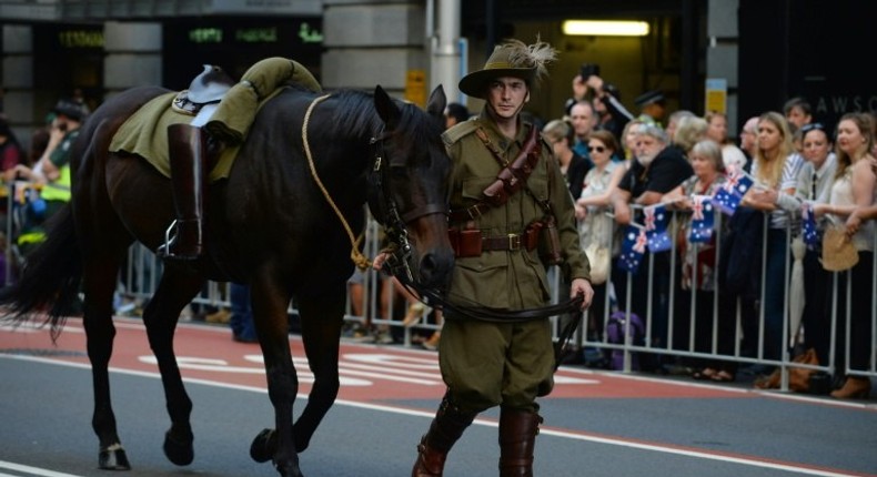 An Australian soldier walks with his horse in the Anzac Day parade in Sydney on April 25, 2017