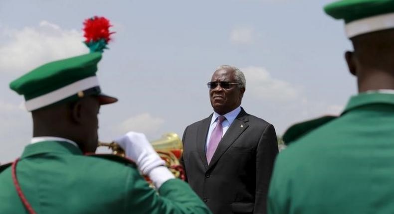 Sao Tome and Principe's President Manuel Pinto da Costa stands on the podium inspecting the honour guards at the airport in Abuja, Nigeria May 28, 2015. 