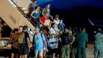 Italian nationals and other European and American citizens, who have been evacuated from Niger, days after a junta seized power in the west African country, arrive at Ciampino Airport, near Rome, Italy, August 2, 2023. (REUTERS/Remo Casilli.)