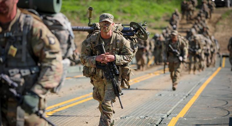 Soldiers with the 101st Airborne Division (Air Assault) execute a wet gap crossing with the 502nd Multi-Role Bridge Company, 19th Engineering Battalion on Fort Knox on April 28, 2022.Staff Sgt. Michael Eaddy/US Army