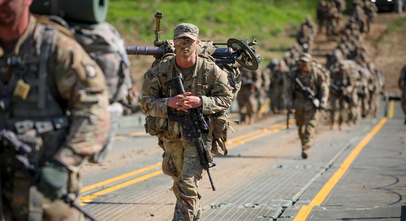 Soldiers with the 101st Airborne Division (Air Assault) execute a wet gap crossing with the 502nd Multi-Role Bridge Company, 19th Engineering Battalion on Fort Knox on April 28, 2022.Staff Sgt. Michael Eaddy/US Army