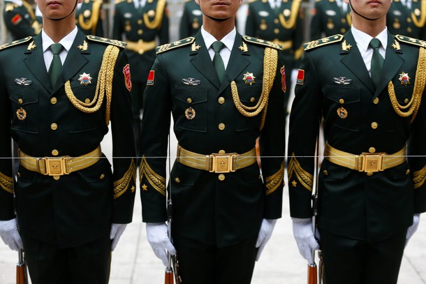 Members of the honour guard prepare for a welcoming ceremony at the Great Hall of the People in Beij