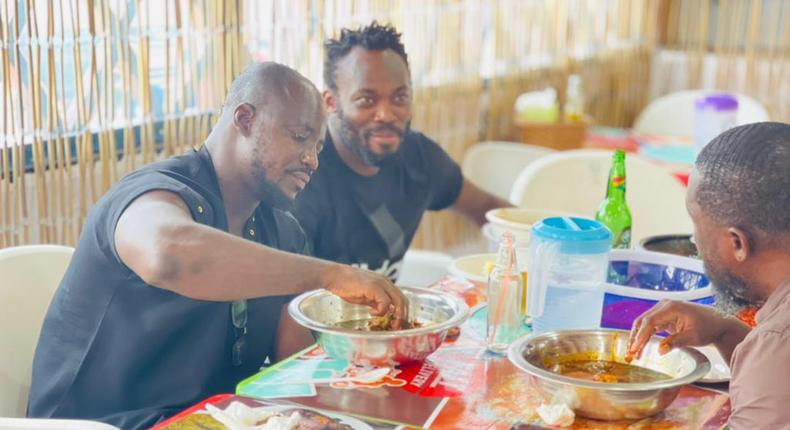 Fans in awe of Essien and Appiah as ex-Black Stars duo feast in chop bar