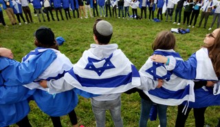 Tejchman: Wspólnota pod dwiema flagami