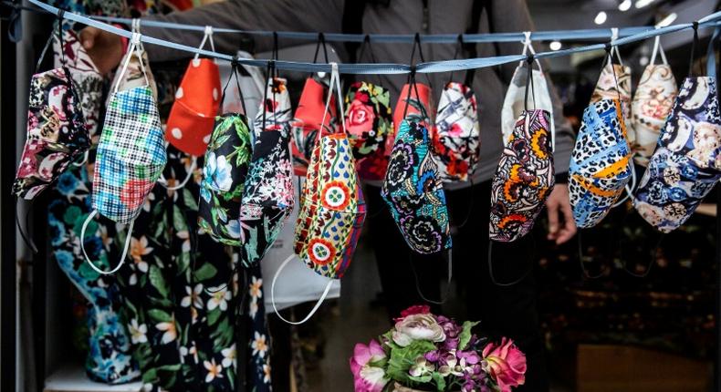 Colourful masks on sale at a shop in Hong Kong, where residents are having to be inventive because of a shortage of recommended supplies