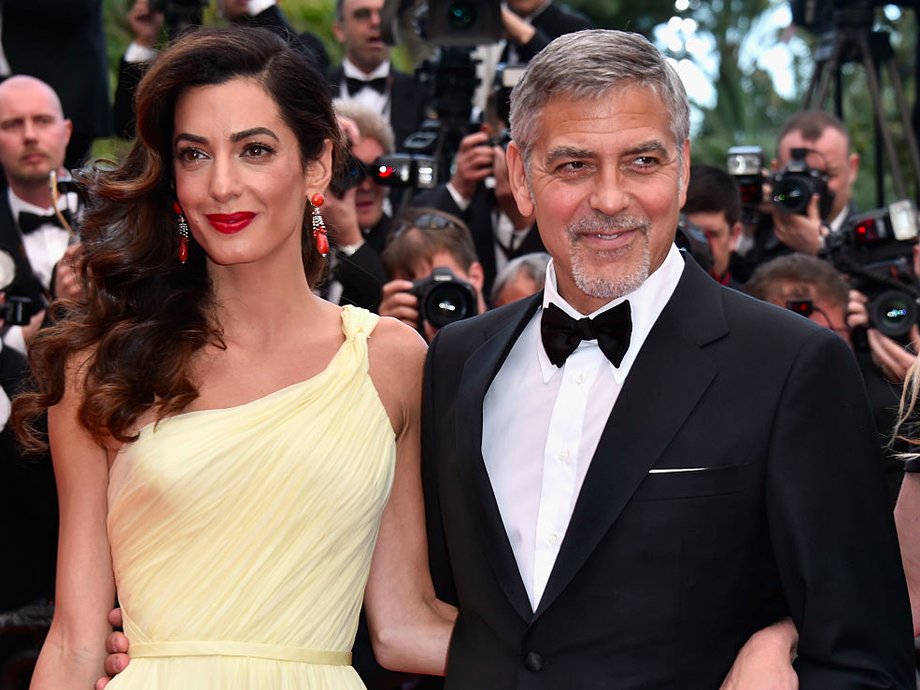 George Clooney in Cannes, France for a "Money Monster" showing wearing a black tux.