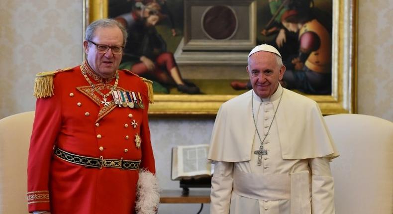 Pope Francis (R) and Grand Master Matthew Festing during a 2016 meeting at the Vatican