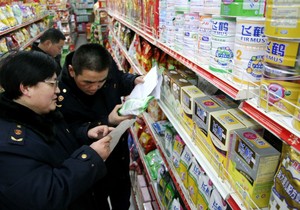 11232_mleko-melamin-kina-afp