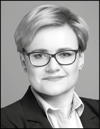 Dr Monika Kwiecień-Miland, doktor nauk prawnych, radca prawny, wykładowca akademicki, były zastępca dyrektora w Ministerstwie Nauki i Szkolnictwa Wyższego