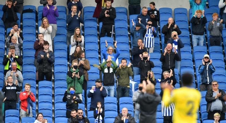 Fans attend a pre-season friendly between Brighton and Chelsea on a socially distanced basis