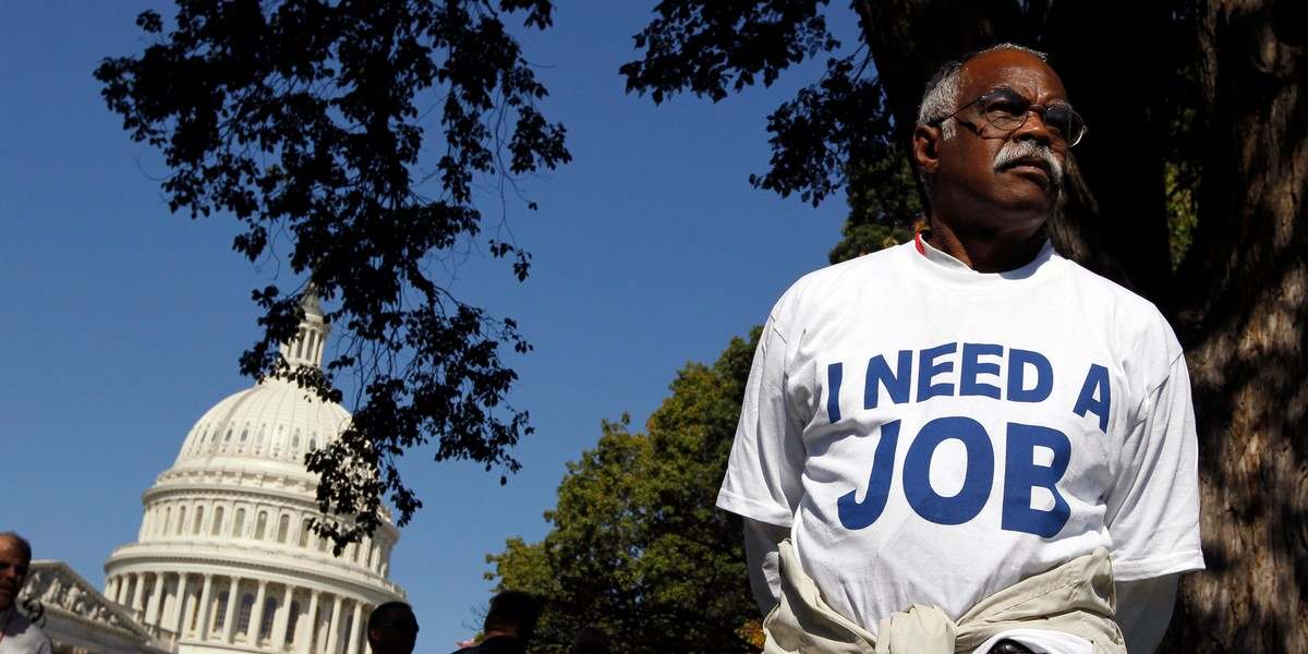 Mervin Sealy from Hickory, North Carolina, takes part in a protest rally outside the Capitol Building in Washington, October 5, 2011. Demonstrators were demanding that Congress create jobs, not make budget cuts during the protest.