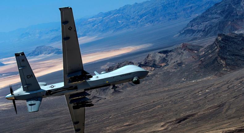 An MQ-9 Reaper remotely piloted drone aircraft performs aerial maneuvers over Creech Air Force Base