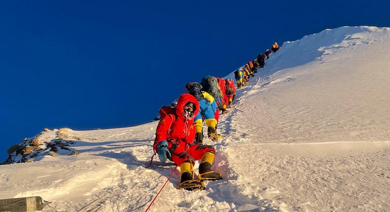 Mountaineers are seen making their ascent of Mount Everest on May 12, 2021.PEMBA DORJE SHERPA/AFP via Getty