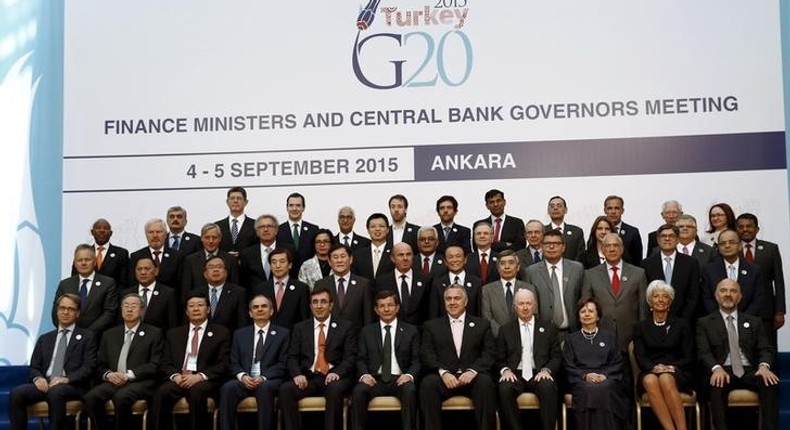 Turkey's Prime Minister Ahmet Davutoglu (6th L), finance ministers and central bank governors gather for a group photo of the G20 Finance Ministers and Central Bank Governors in Ankara, Turkey, September 5, 2015. Finance ministers and central bank governors from the Group of 20 leading economies met in Turkey on Friday and Saturday, with slower growth in China and rising market volatility boosting the risks to the global economy. REUTERS/Umit Bektas