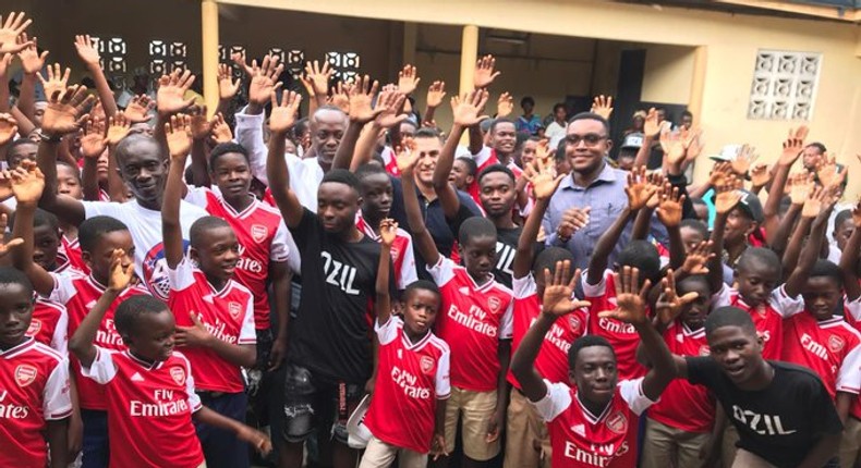 Arsenal’s Mesut Ozil reacts after discovering Ghanaian club is named after him