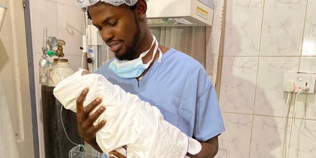 Fameye celebrates fatherhood with delivery day photo of his son | Pulse  Ghana