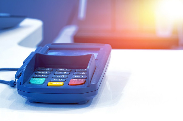 Payment terminal on table in restaurant.