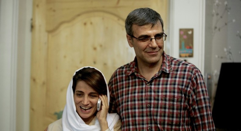 Iranian humman rights lawyer Nasrin Sotoudeh seen in this 2013 picture alongside her husband is an award-winning activist jailed on charges of espionage