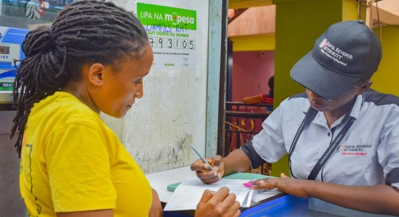 A KRA Revenue Service Assistant RSA attending to a businesswoman in Nairobi on September, 27 2023