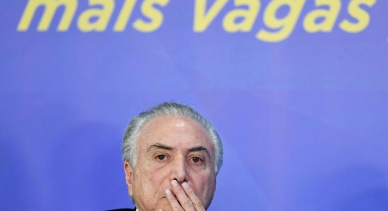 Brazilian President Michel Temer looks on during a public event as his fate is weighed by Brazil's Congress