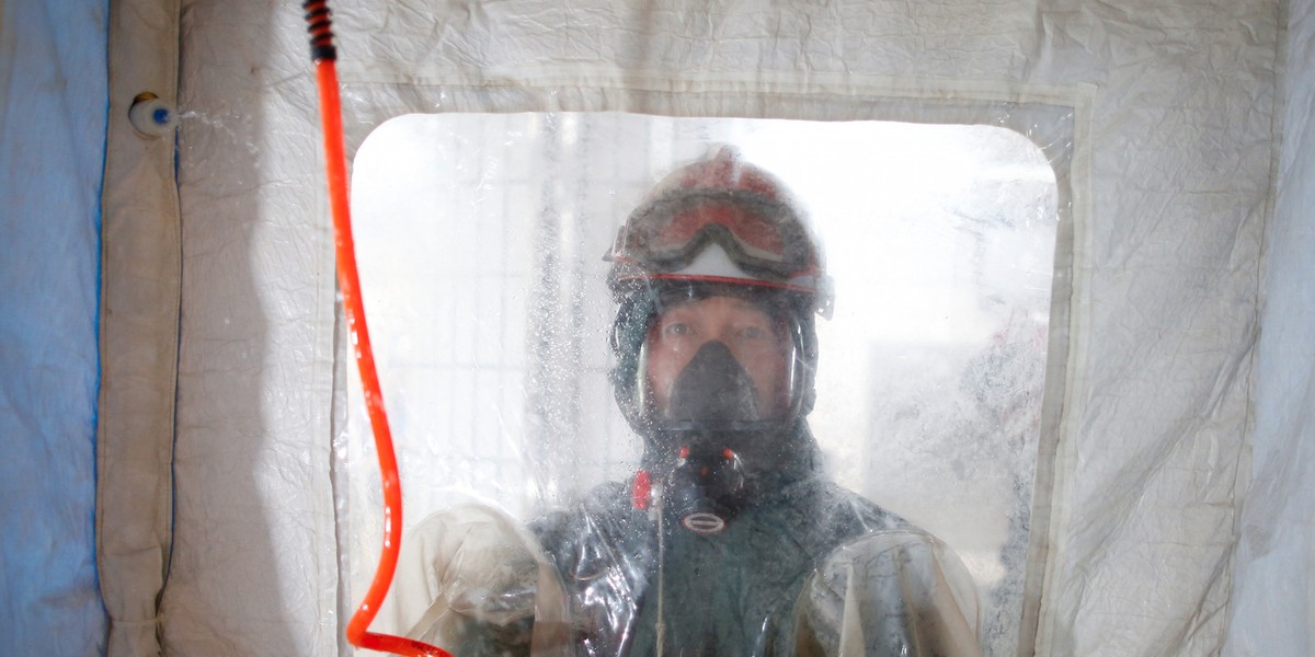 A firefighter participating in an antiterror drill as a part of the Ulchi Freedom Guardian exercise at a subway station in Seoul, South Korea.