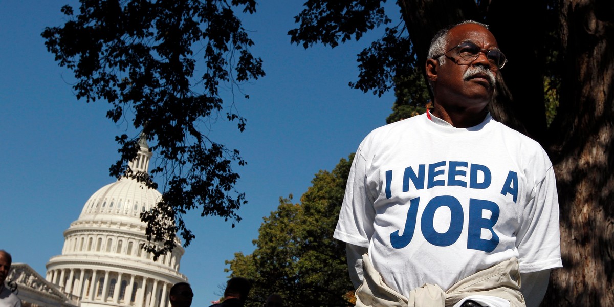 Mervin Sealy from Hickory, North Carolina, takes part in a protest rally outside the Capitol Building in Washington, October 5, 2011. Demonstrators were demanding that Congress create jobs, not make budget cuts during the protest.