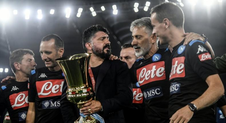 Gennaro Gattuso (C with trophy) celebrates his first trophy as coach with Napoli in the Italian Cup.