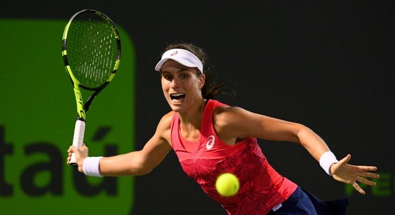 Johanna Konta of Great Britain returns the ball during the semifinals match against Venus Williams on day 11 of the Miami Open at the Crandon Park Tennis Center on March 30, 2017 in Key Biscayne, Florida