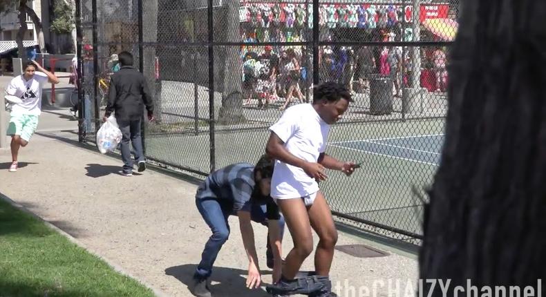Watch hilarious pulling down people's pant prank