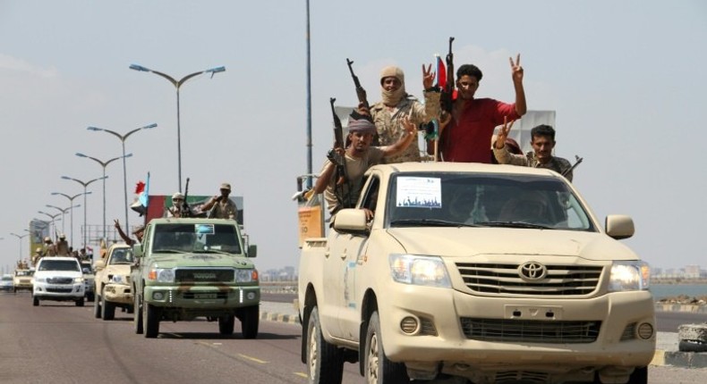 Yemeni fighters from the separatist Southern Movement, loyal to the government forces, arrive for a rally on October 13, 2016, in the southern city of Aden