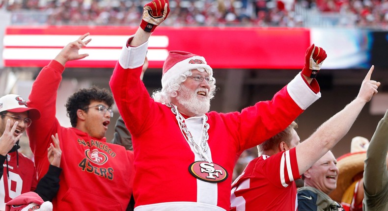 An NFL fan dressed as Santa Claus on Christmas Day.Lachlan Cunningham/Getty Images