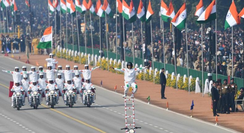 For the first time, the riders performing daredevil stunts on motorbikes to the delight of the crowds lining New Delhi's central Rajpath boulevard, were women