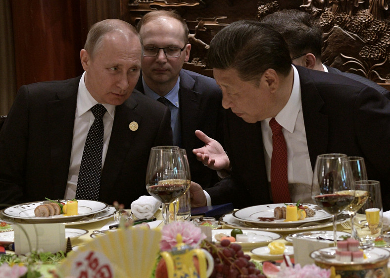 Xi Jinping i Władimir Putin podczas śniadania w Pekinie w 2017 r.