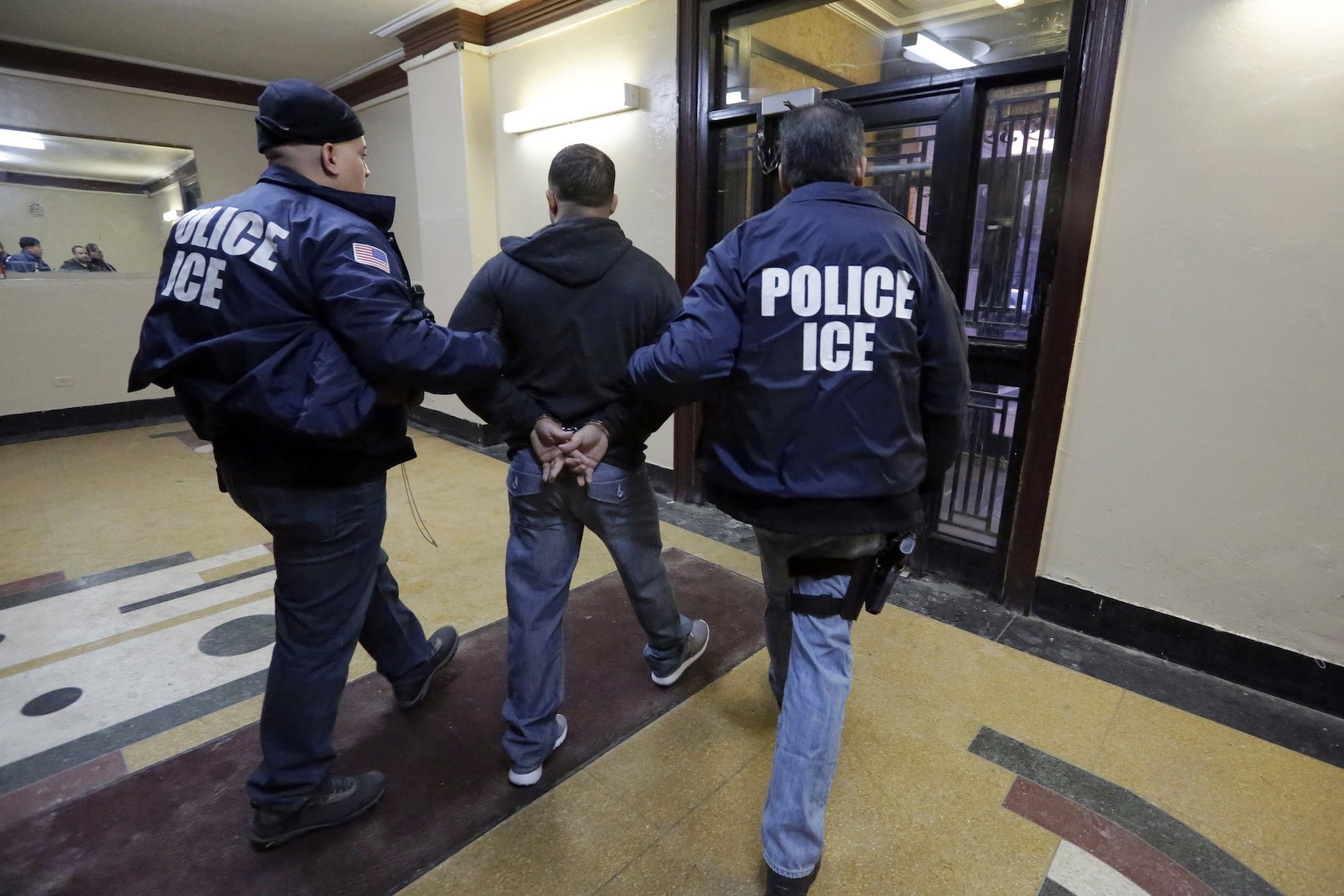 An American citizen was detained at ICE's request and flagged for