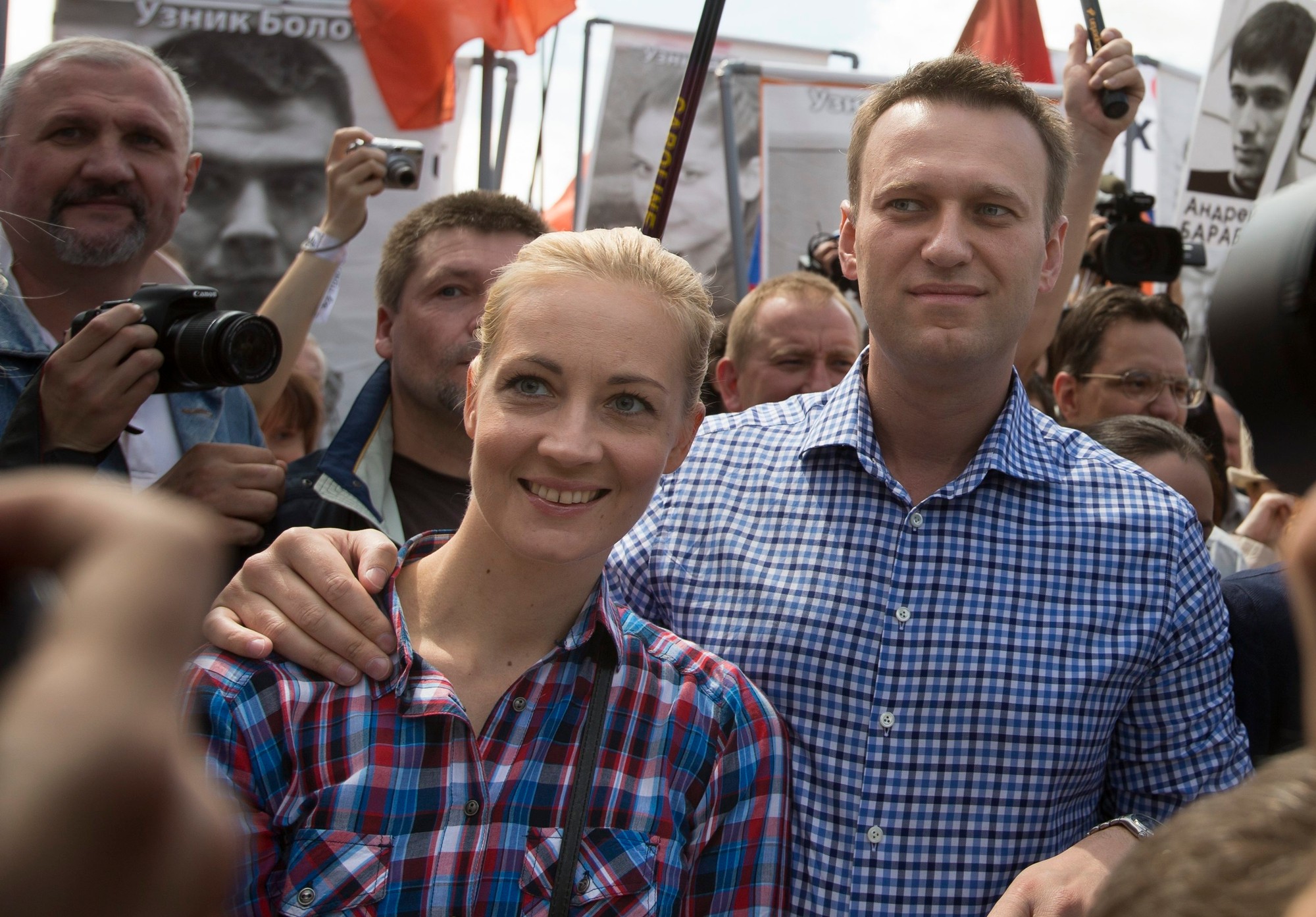 Ruský opozičný politik Alexej Navaľnyj s manželkou.